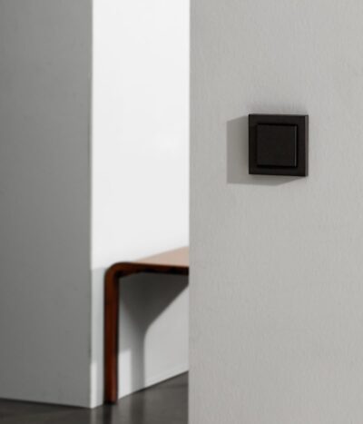 GIRA E2 black light witch on white wall