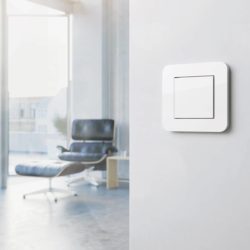 Gira E3 Pure White switch with Eames chair