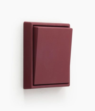 Jung Les Couleurs light switch in Le Rubis