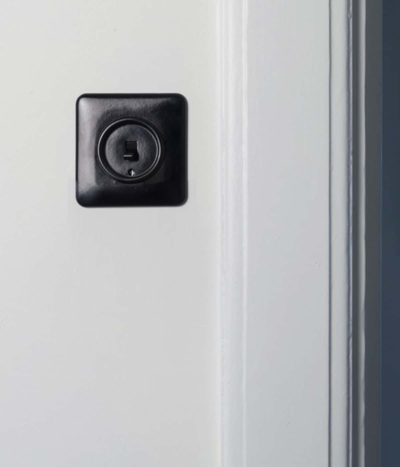 THPG Bakelite toggle light switch on kitchen wall